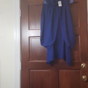 Royal blue sleeveless blouse with sheer draping